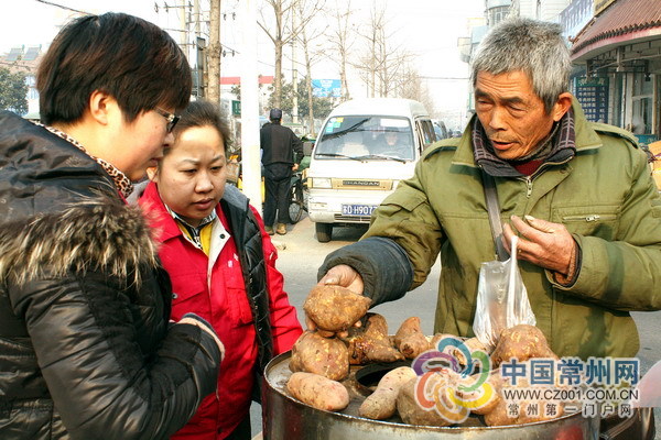 许金生的第3次“转型升级” 烘山芋摊很赚钱