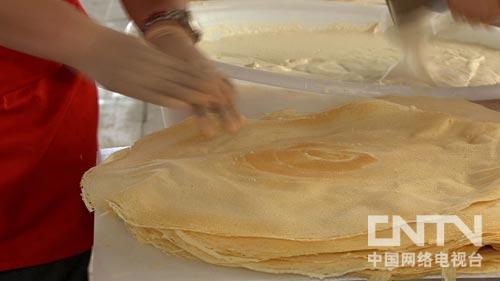 致富经:撑三个月塑料袋 打开了大市场(图:9)